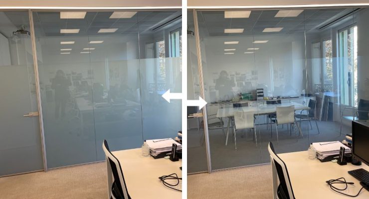 Mamparas de cristal con vinilo de señalización en una oficina